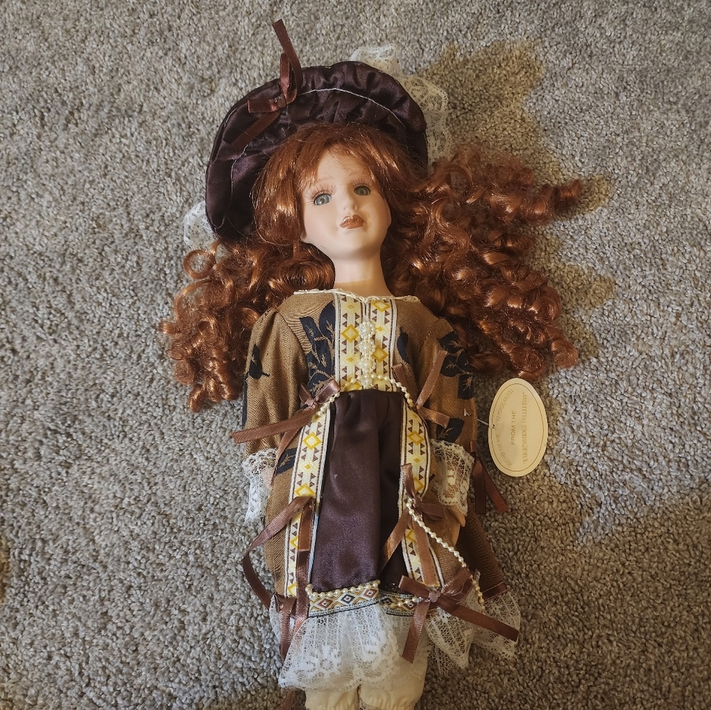 Beautiful porcelain doll from The Knightsbridge collection EUC